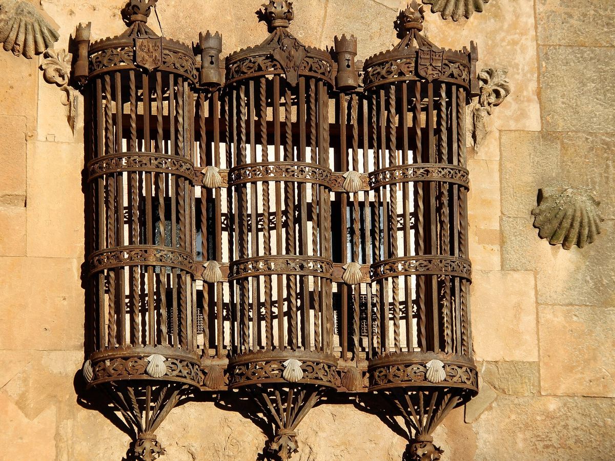 A Gothic wrought-iron window grille on the Casa de las Conchas